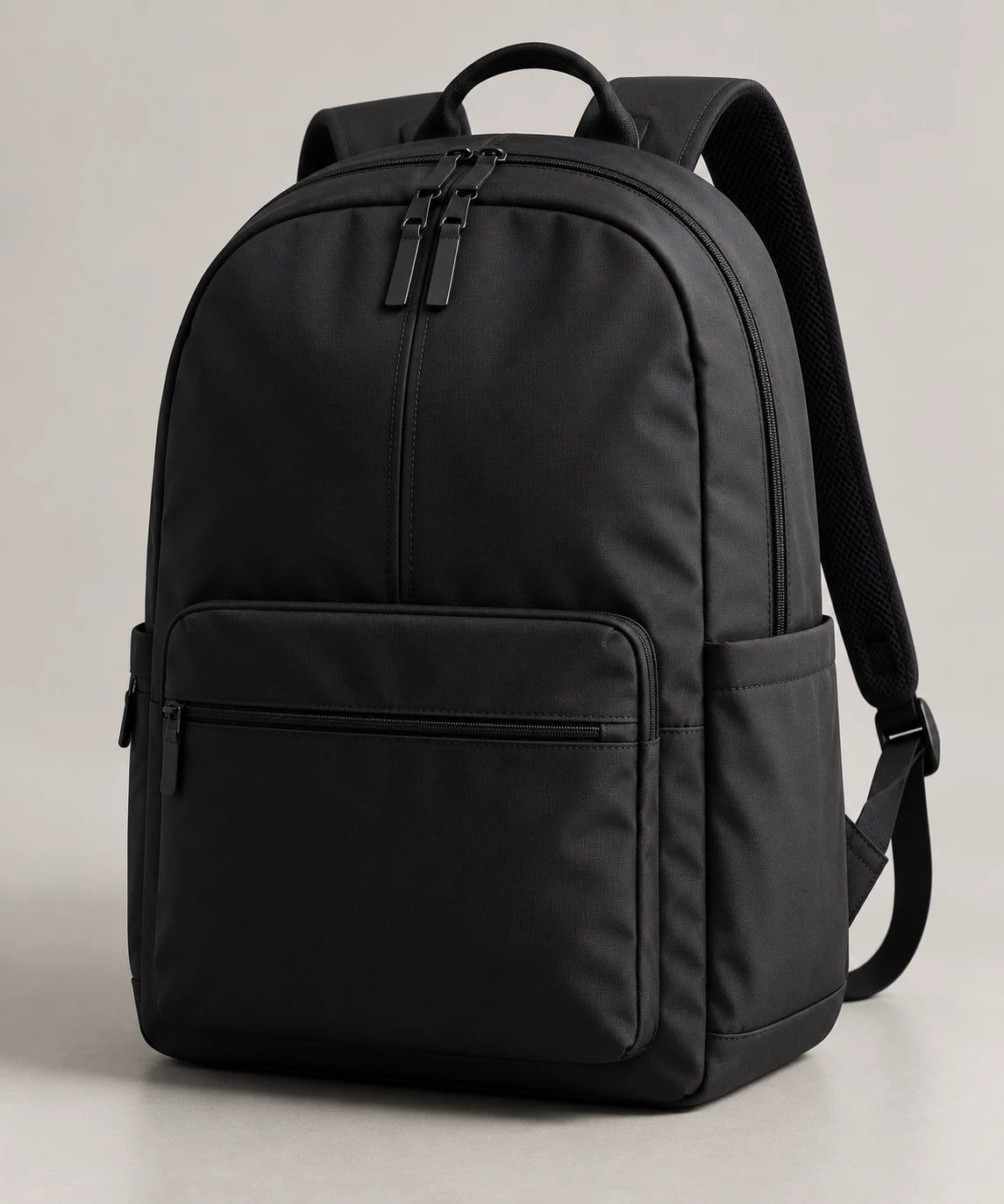 Black backpack with front zip pocket