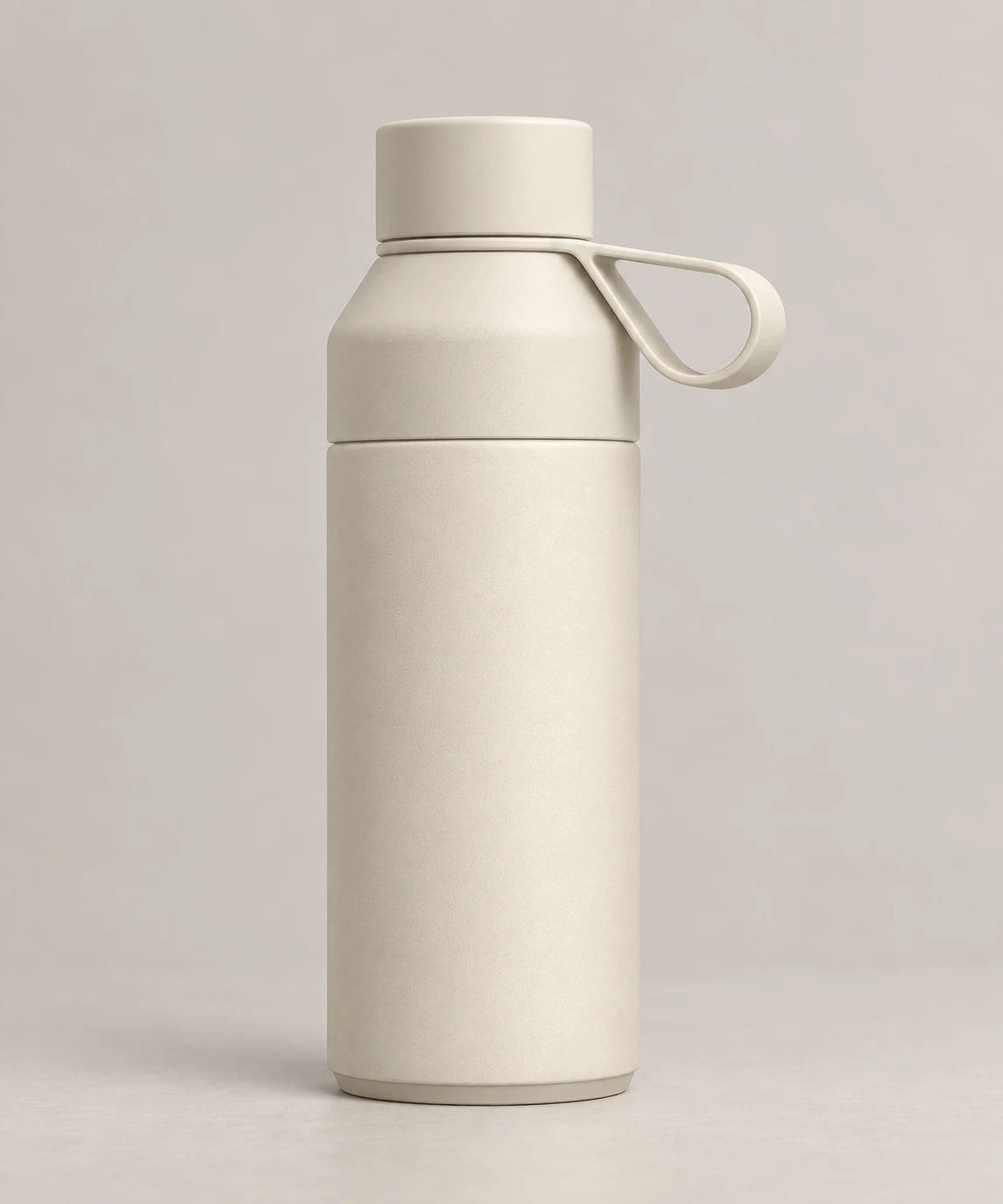 Cream-coloured reusable water bottle with carry loop
